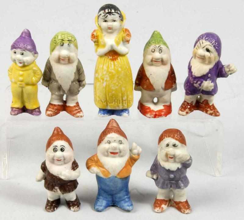 Appraisal: Set of Bisque Snow White the Dwarfs Figures Description Japanese