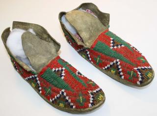 Appraisal: Sioux beaded moccasins length Sioux beaded moccasins length