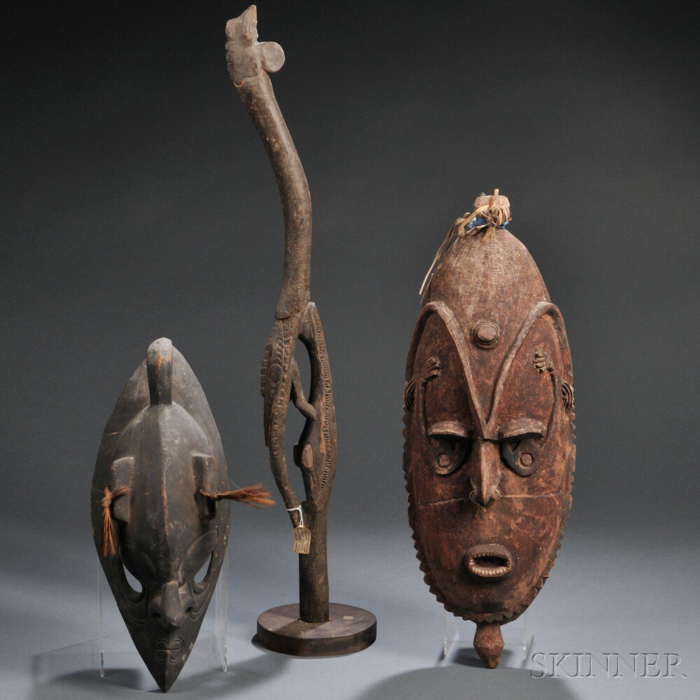 Appraisal: Three New Guinea Items two carved wood masks and a