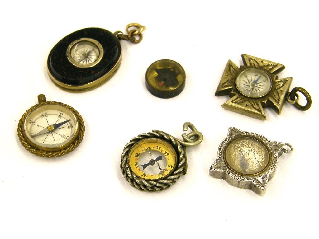 Appraisal: Silver miniature pocket compass of serpentine form marked Birmingham with