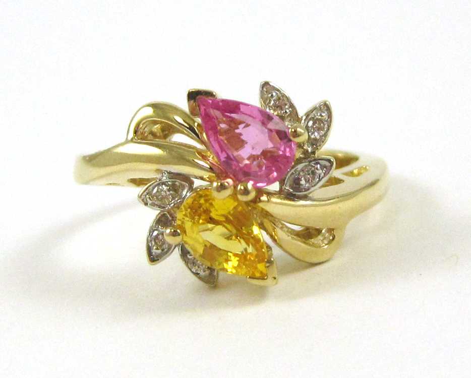 Appraisal: COLORED SAPPHIRE AND FOURTEEN KARAT GOLD RING set with six