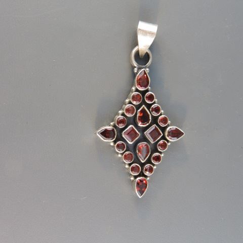 Appraisal: Garnet Pendant rich gems in sterling silver