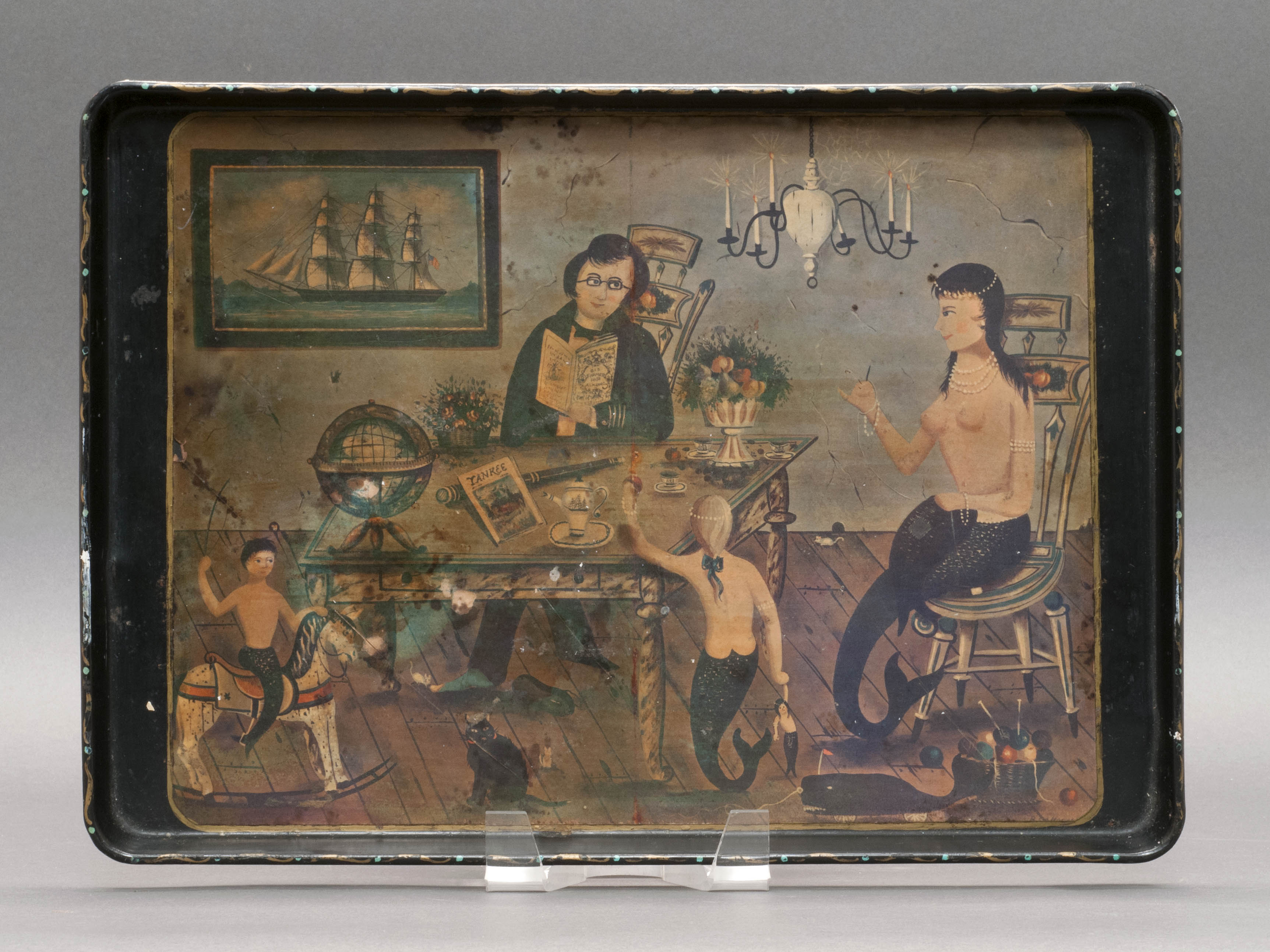 Appraisal: LITHOGRAPHED TIN SERVING TRAY Depicting The Sailor at Home a