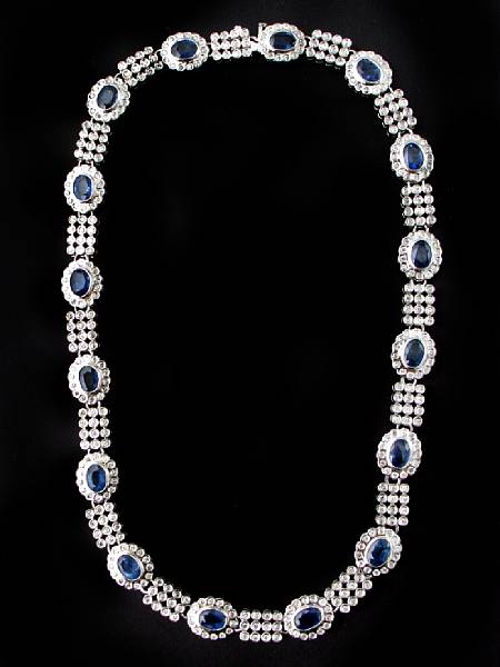 Appraisal: A sapphire diamond and k white gold necklace highlighting oval