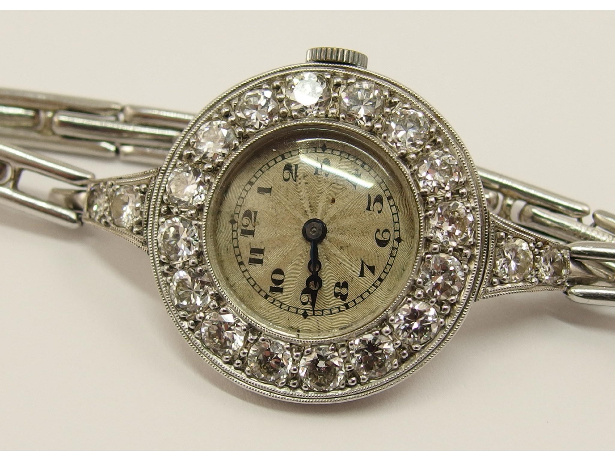 Appraisal: A platinum diamond set Art Deco circular cocktail watch set