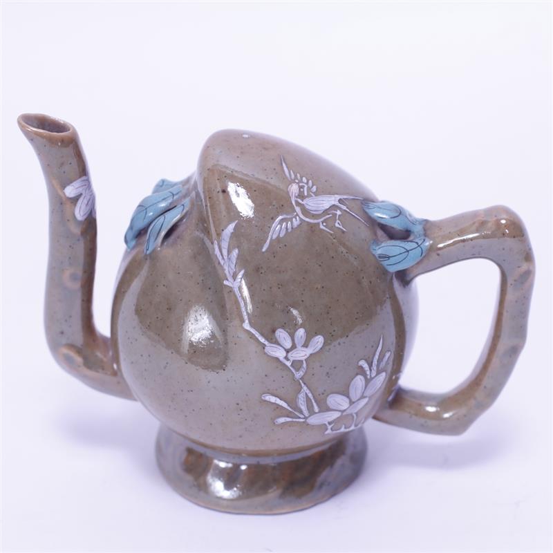 Appraisal: Chinese porcelain figural peach form one piece puzzle teapot with