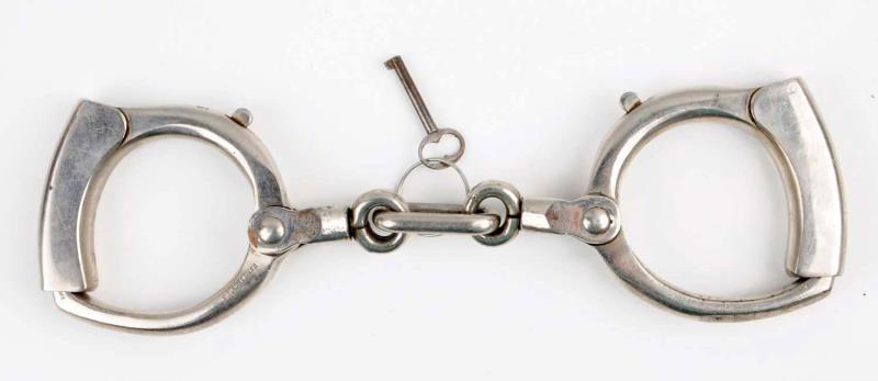 Appraisal: Carberry Handcuff Patent Near mint condition Size L