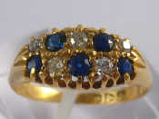 Appraisal: An carat gold sapphire and diamond ring hallmarked Chester size