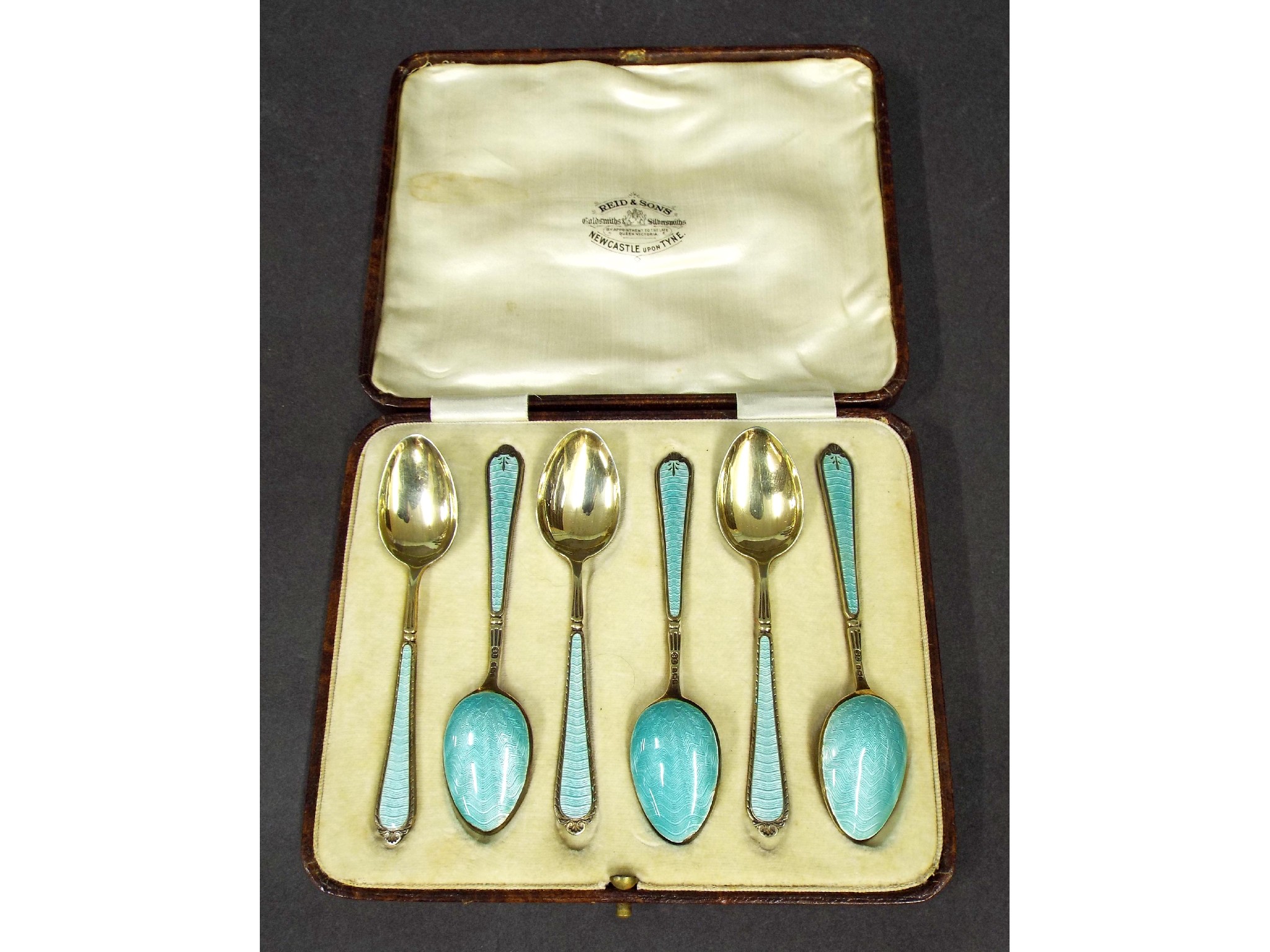 Appraisal: Set of six Art Deco silver-gilt and guilloche enamel teaspoons