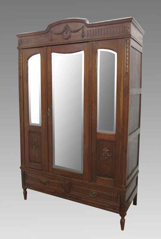 Appraisal: ENGLISH OAK ARMOIRE Triple mirror front armoire '' h x