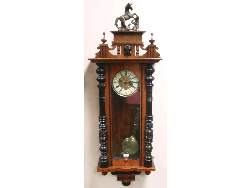 Appraisal: A late Victorian Vienna style wall clock with an eight