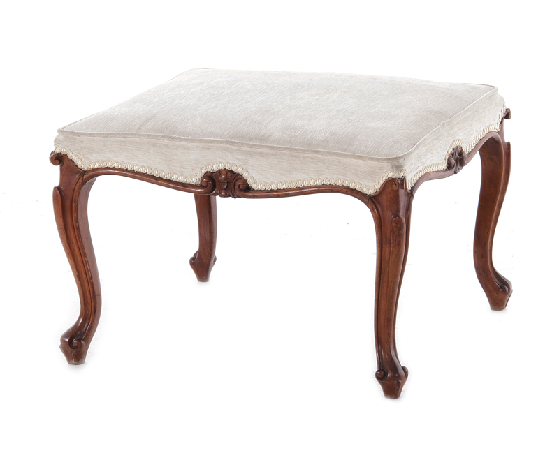 Appraisal: Continental carved fruitwood footstool circa upholstered H W D Condition