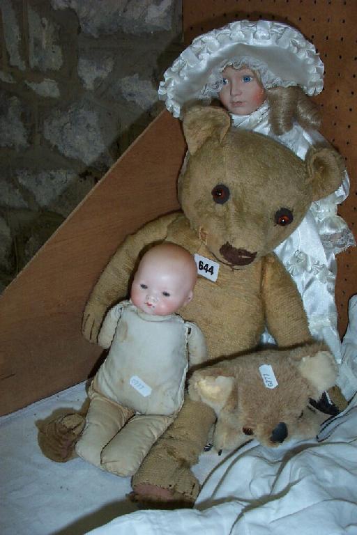 Appraisal: A miscellaneous collection of toys including an Edwardian teddy bear