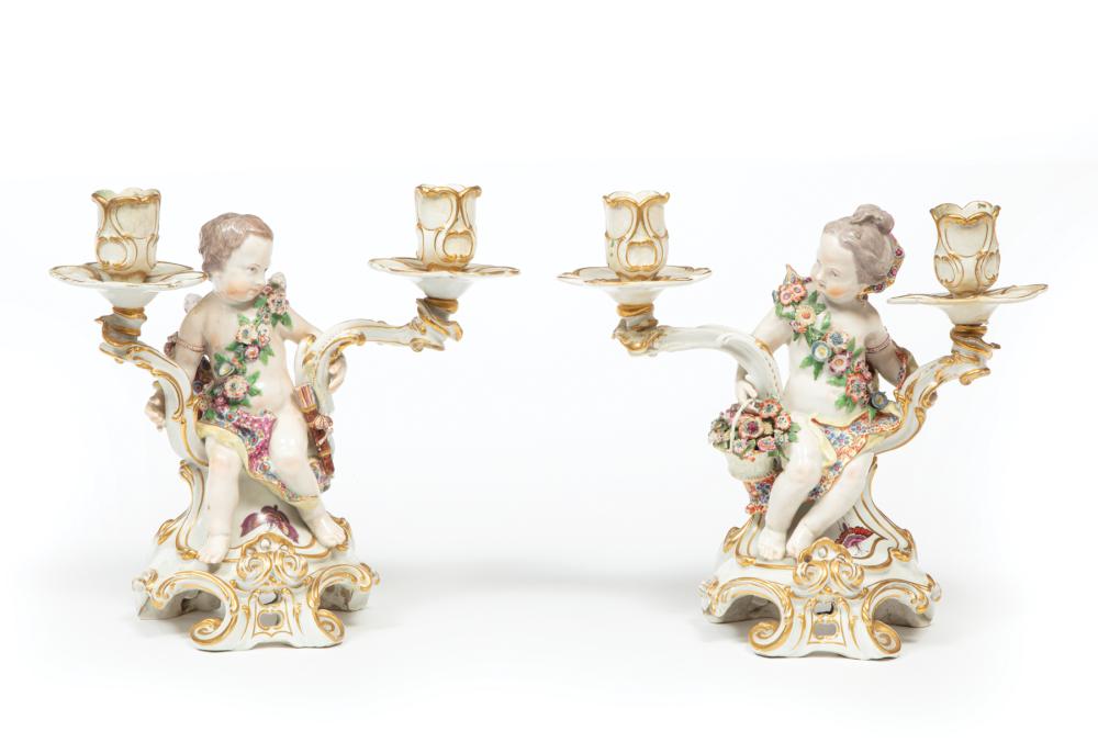 Appraisal: Pair of Chelsea Porcelain Figural Two-Light Candelabra marked putti draped