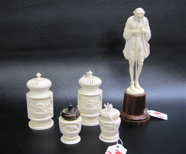 Appraisal: FIVE HAND CARVED IVORY PIECES Mahatma Ghandi standing on attached