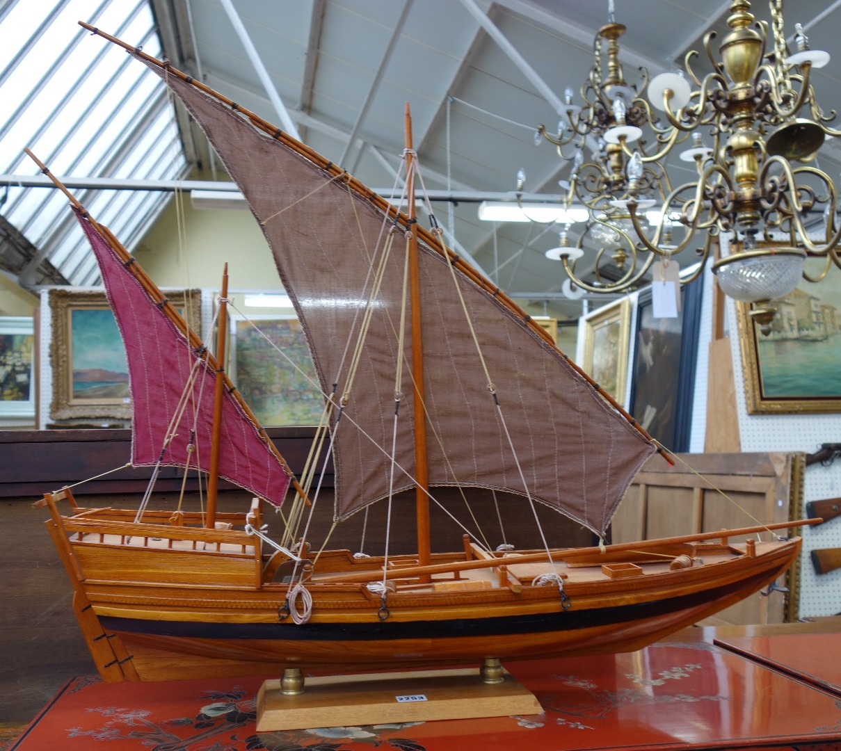 Appraisal: A wooden model of an Arab Dhow fully rigged on