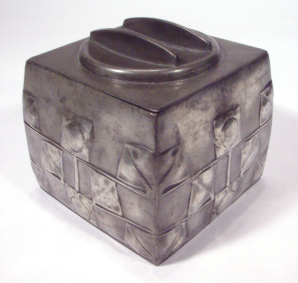 Appraisal: Libertys Tudric Art Nouveau pewter biscuit barrel and cover embossed