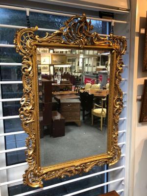 Appraisal: An th Century style gilt framed mirror the pierced scrolling