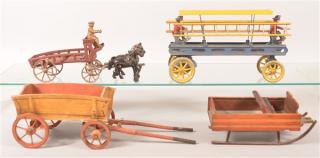 Appraisal: Four Various Toys Cast Iron Horse Drawn Wagon Tin Horseless