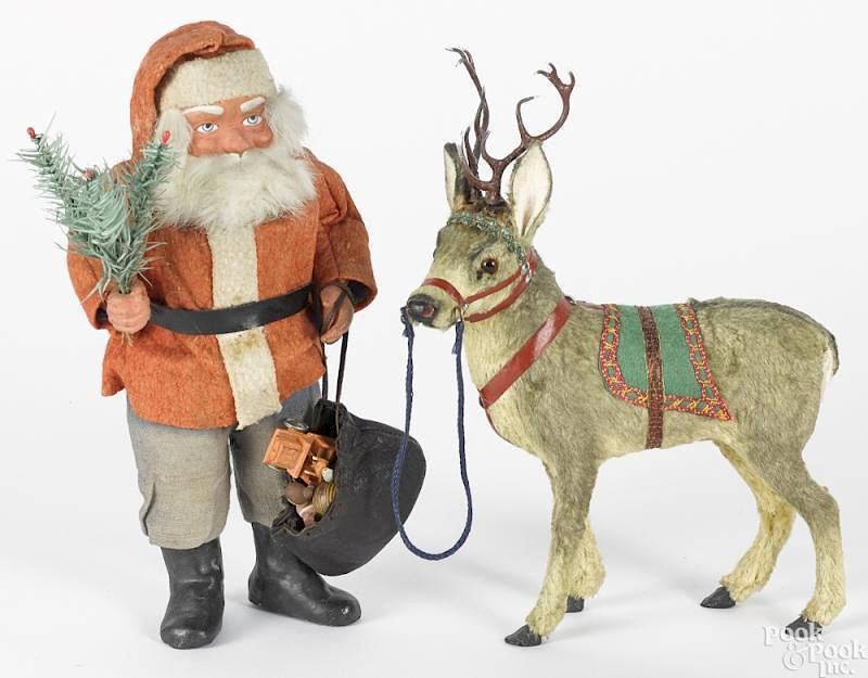 Appraisal: German composition Belsnickle Santa and reindeer Large German composition Belsnickle