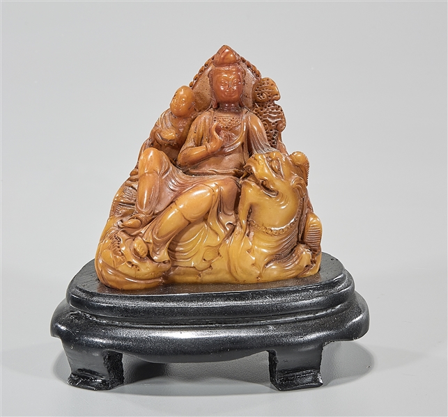 Appraisal: Chinese shoushan stone seal depicting Guanyin and attendant atop lion