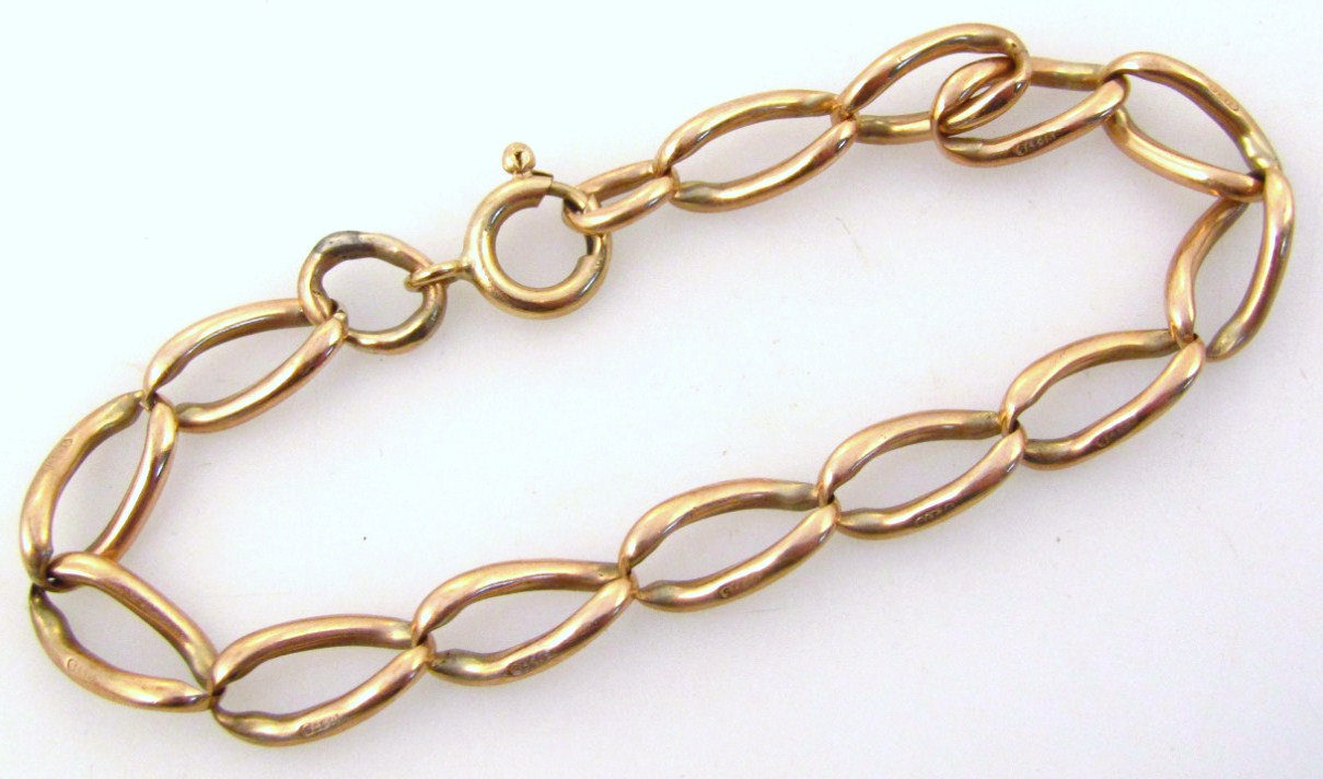 Appraisal: A heavy link bracelet with plain clasp each link marked