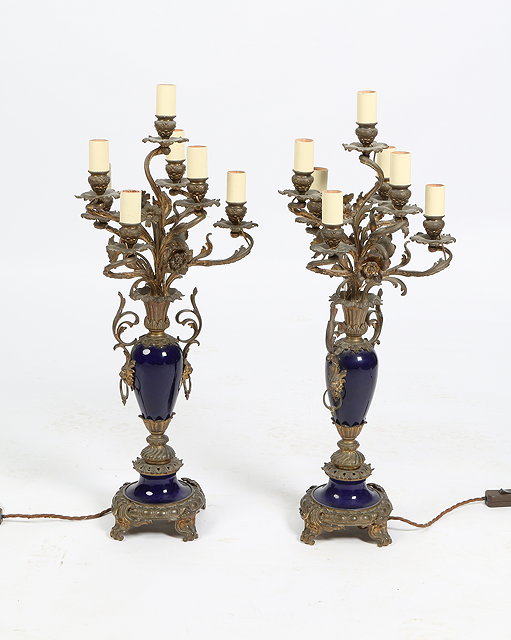 Appraisal: A PAIR OF LOUIS XV STYLE SEVEN LIGHT CANDELABRA with