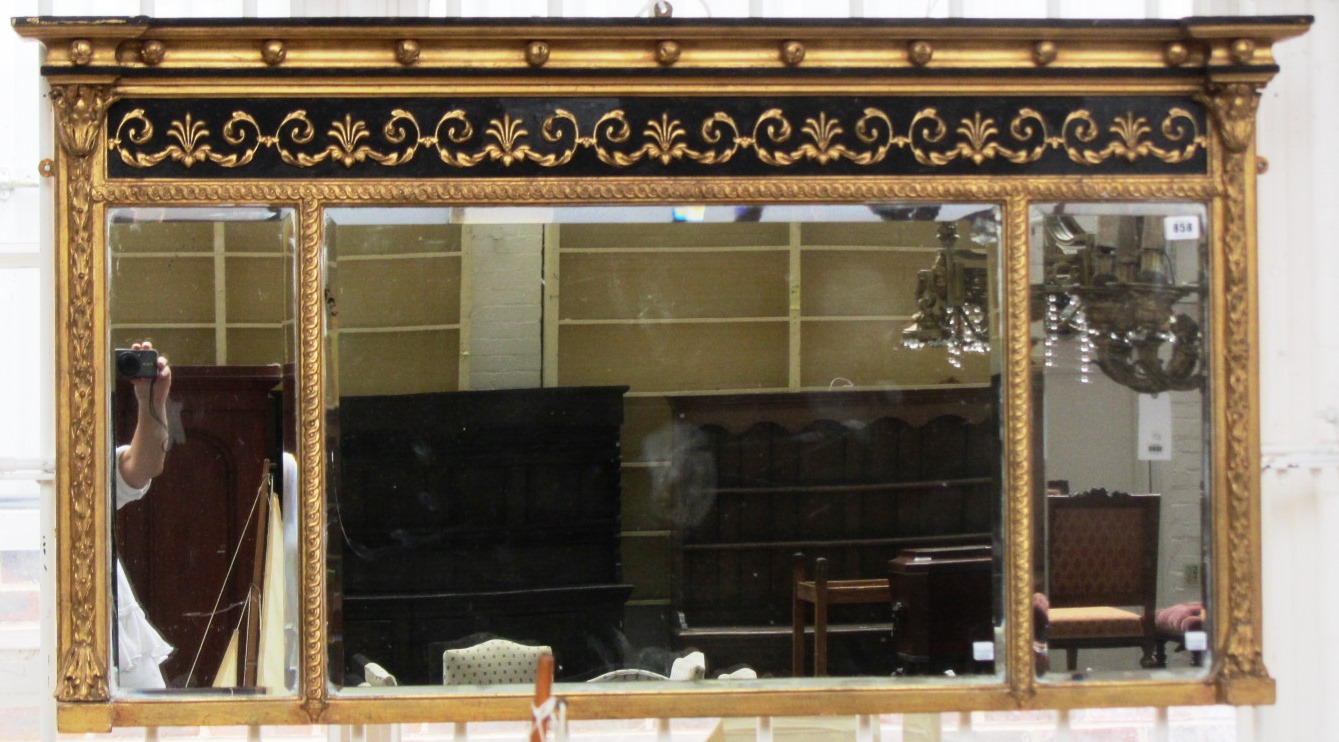 Appraisal: An early th century gilt framed overmantel mirror with ball