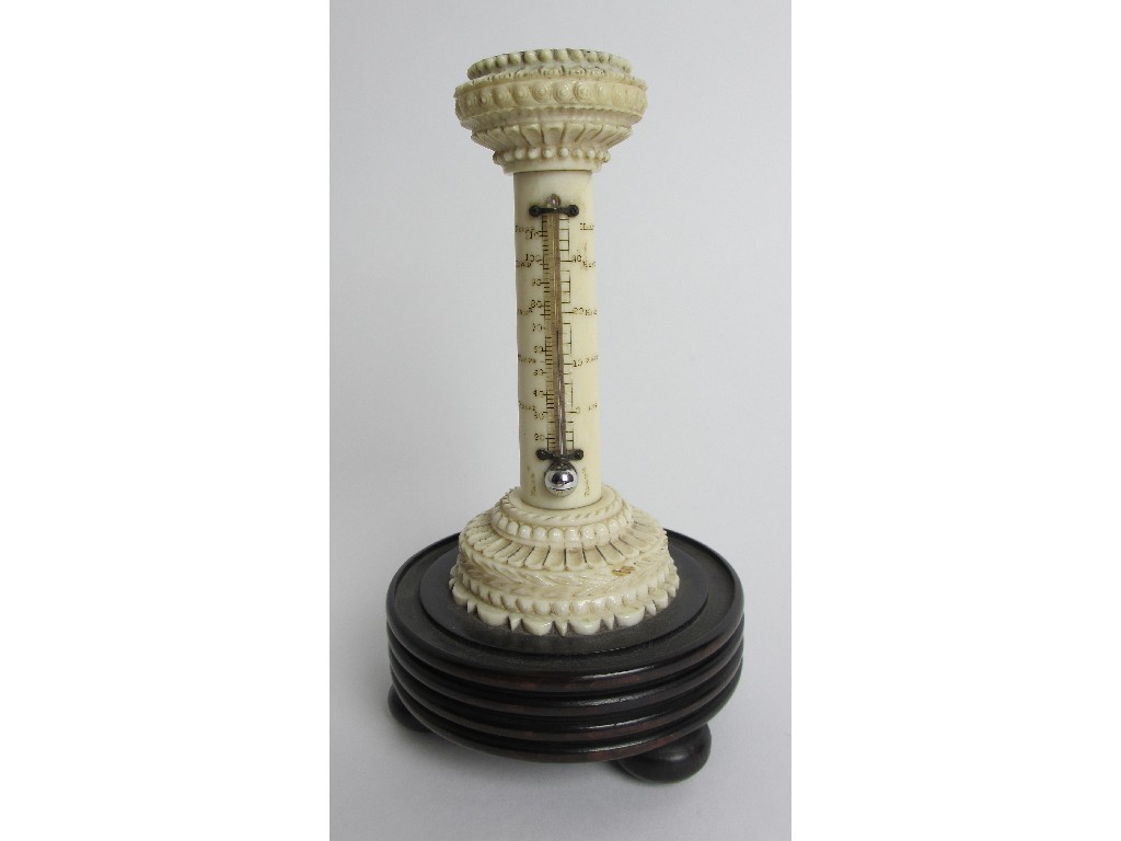 Appraisal: An early Victorian ivory thermometer and compass carved as a