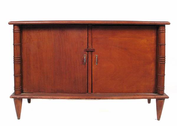 Appraisal: A French two door cabinet in the manner of Leon