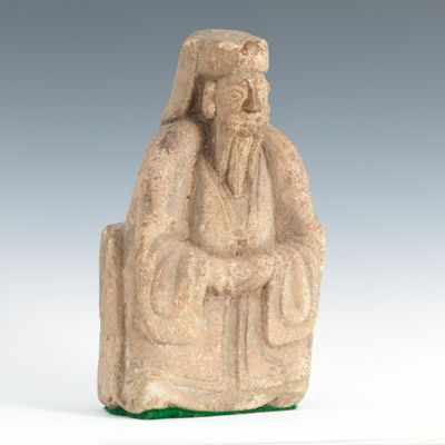 Appraisal: A Carved Stone Tomb Figure Seated man holding an offering