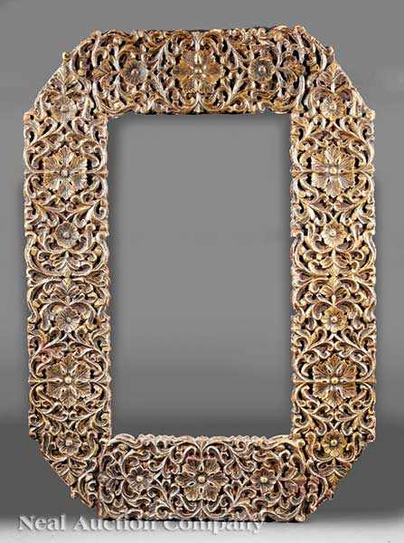 Appraisal: An Antique Middle-Eastern Carved Mirror Frame highly carved foliate decoration