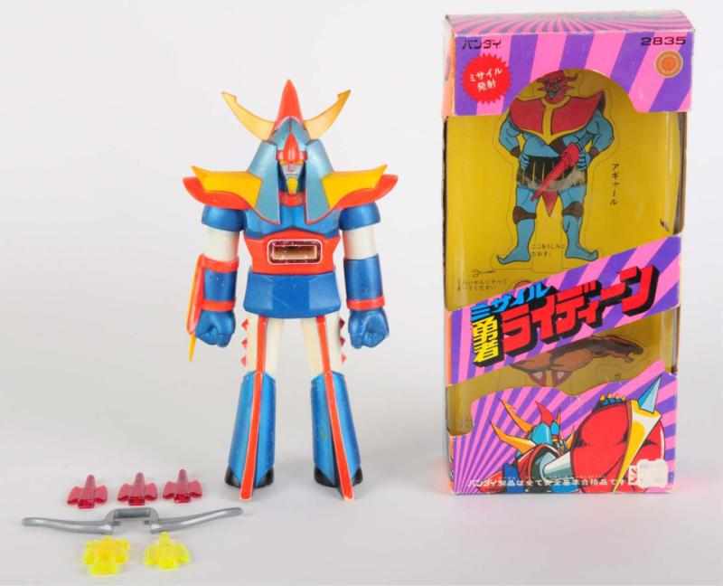 Appraisal: Raideen Missile Firing Vinyl Bandai Egyptian style Raideen is a