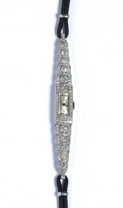 Appraisal: DIAMOND LADY'S WRISTWATCH BUCHERER ca Platinum Rectangular case No with