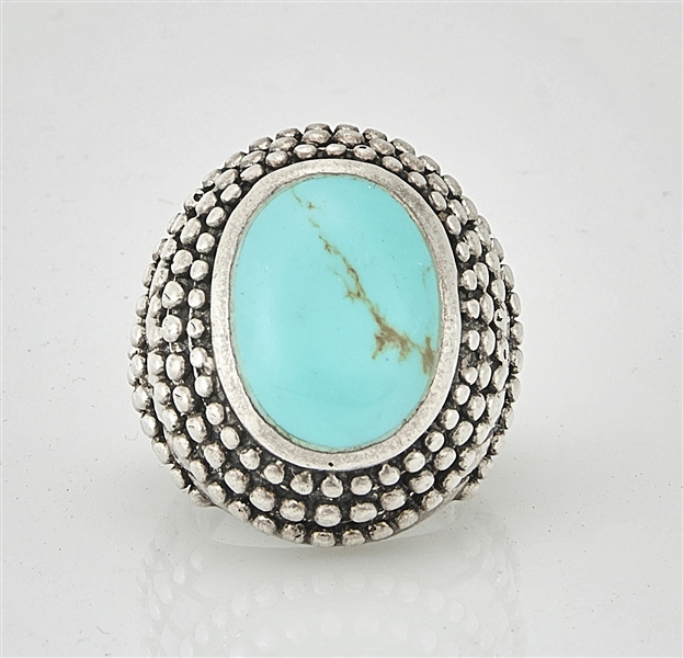 Appraisal: Native American silver ring set with turquoise cabochon stamped with