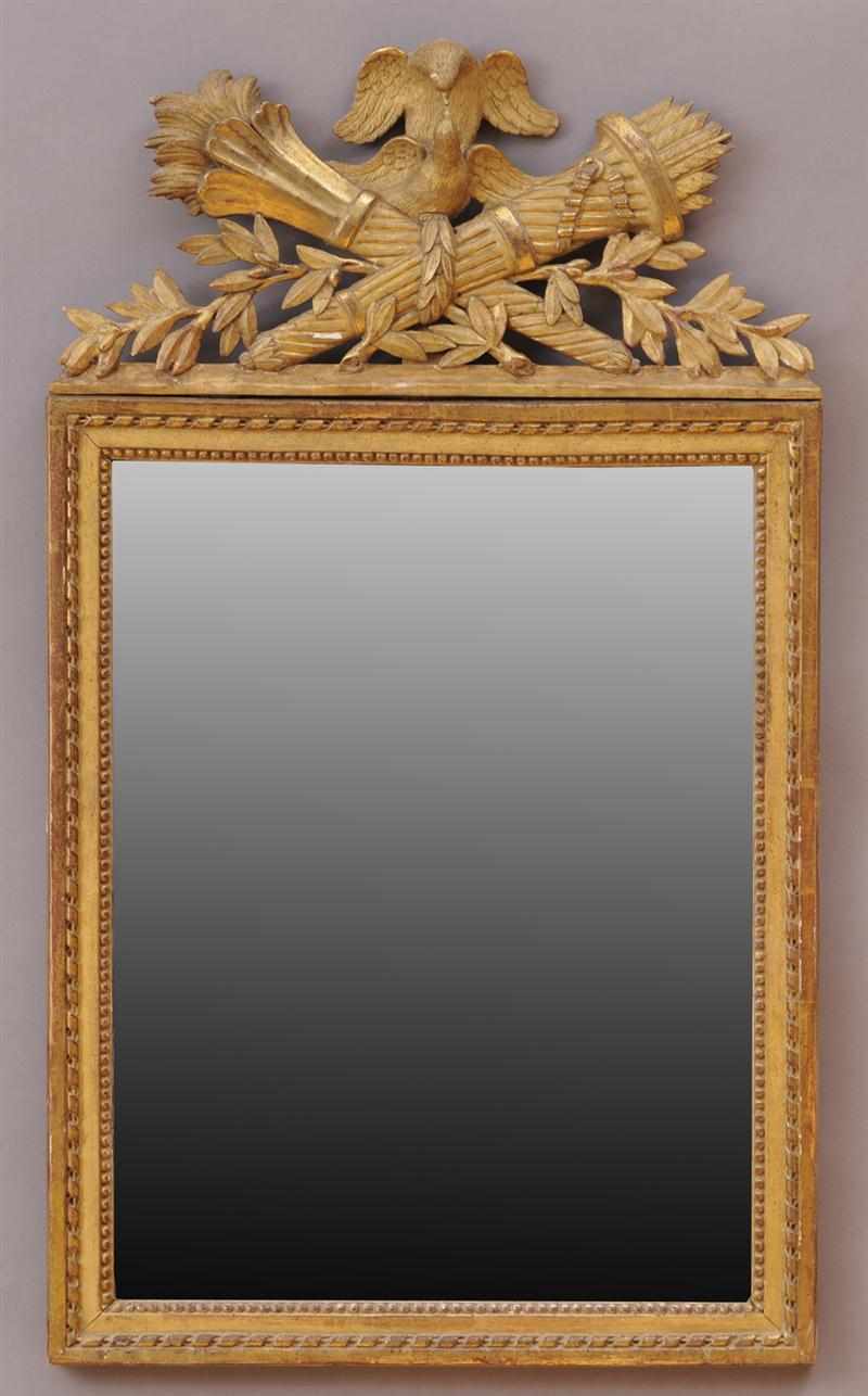 Appraisal: LOUIS XVI CARVED GILTWOOD MIRROR The beaded and ribbon-twist frame