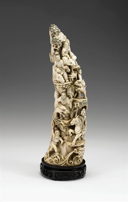 Appraisal: Large Chinese elephant ivory grouping early th century Of slightly