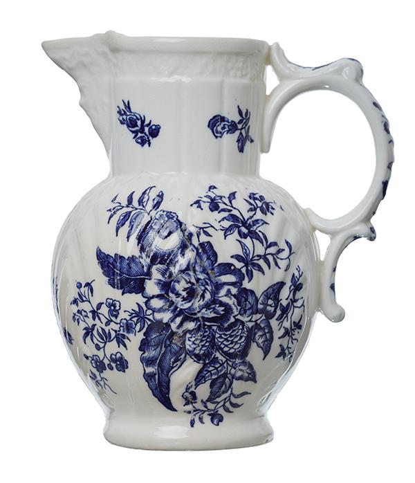 Appraisal: A CAUGHLEY PORCELAIN BLUE AND WHITE MASK JUG Of typical