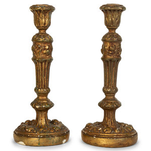 Appraisal: A Pair of Carved Giltwood Candlesticks th Century Height inches