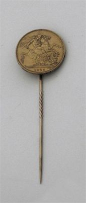 Appraisal: A George IV gold coin dated mounted on a stick