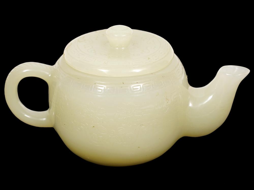 Appraisal: CHINESE JADE SMALL TEAPOTChinese small Jade teapot with incised floral