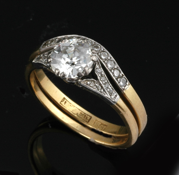 Appraisal: A DIAMOND SOLITAIRE RING AND MATCHING ETERNITY RING The old