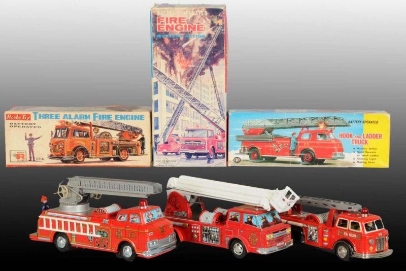 Appraisal: Lot of Battery-Operated Toy Fire Trucks in O B Description