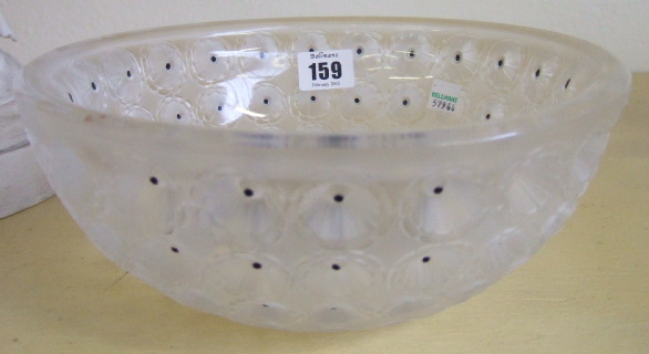 Appraisal: A Lalique clear and frosted glass bowl with moulded flowerhead