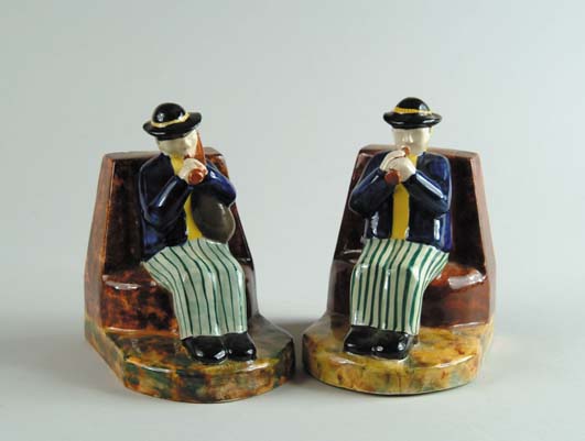 Appraisal: PAIR OF FRENCH QUIMPER FIGURAL BOOKENDS Bookends show seated man