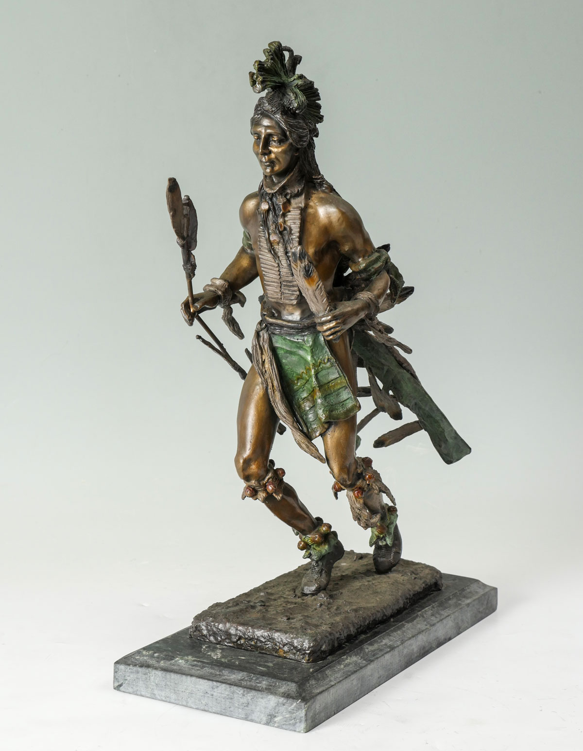 Appraisal: PATINATED BRONZE INDIAN BRAVE AFTER REMINGTON Approx '' high with