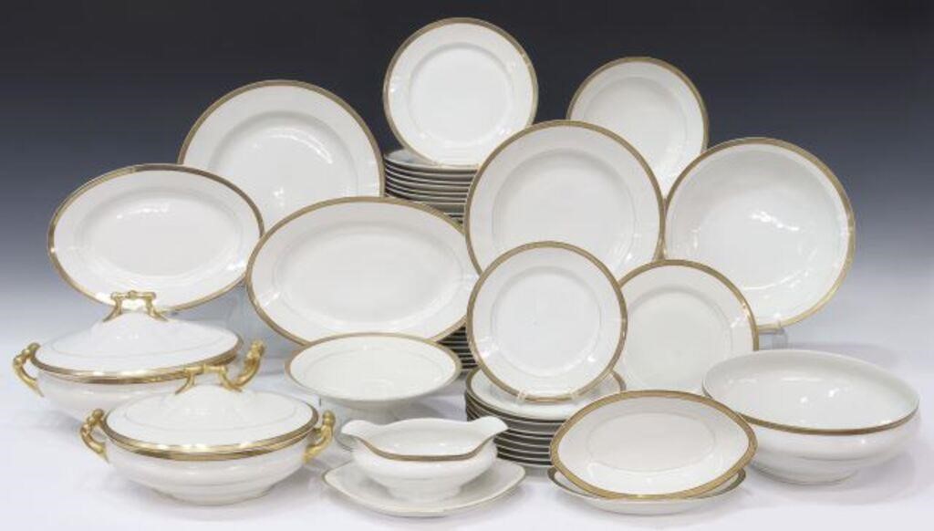 Appraisal: lot of French parcel gilt porcelain dinner service having white