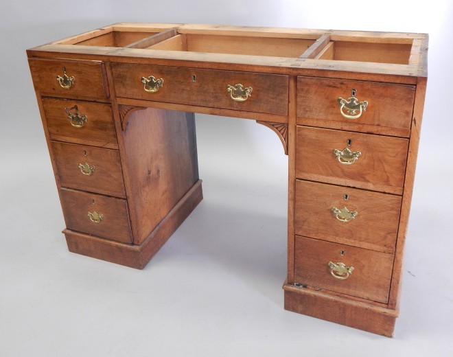 Appraisal: A thC walnut dressing table with an arrangement of nine