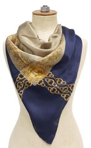 Appraisal: Chanel silk scarf in royal blue gold and taupe accented