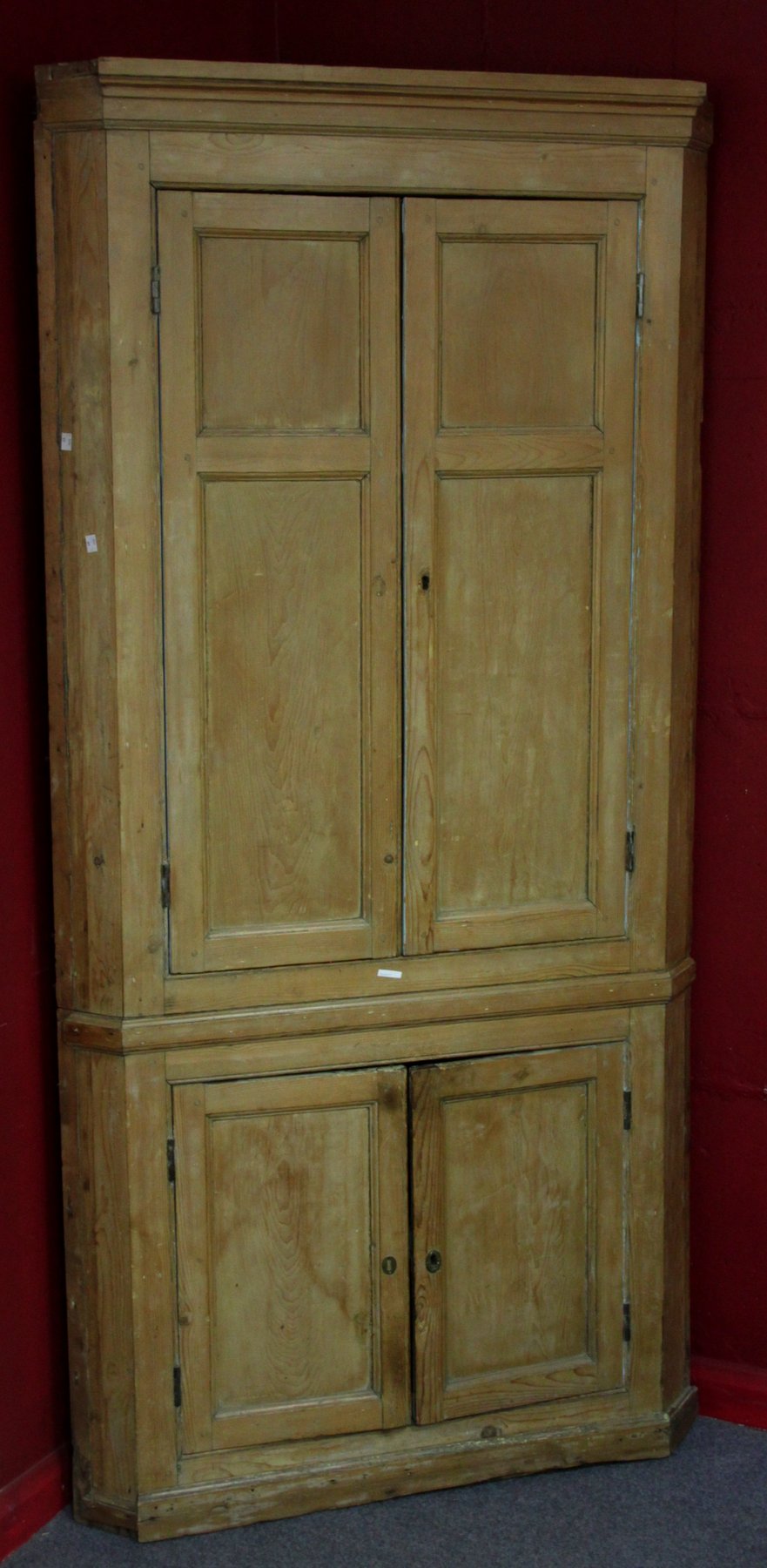 Appraisal: A Victorian pine standing corner cupboard with panelled door cm